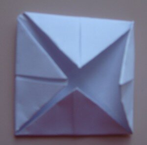 Оригами птица вороненок - шаг 4