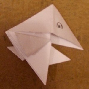 Оригами птица вороненок - шаг 10