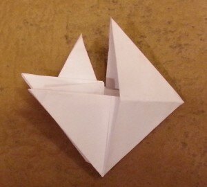 Оригами птица вороненок - шаг 8